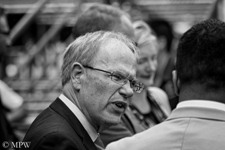 Queen Street Auckland city, Mayor Len Brown, black and white photo by Mike Wheelton